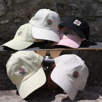 image de notre collection de casquette stylz vintage avec des couleurs pastel et le logo brodé à l'avant alohasurfwear